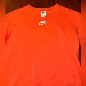 Pink nike crewneck, looks more pink in real life. Runs super small. Long sleeve.